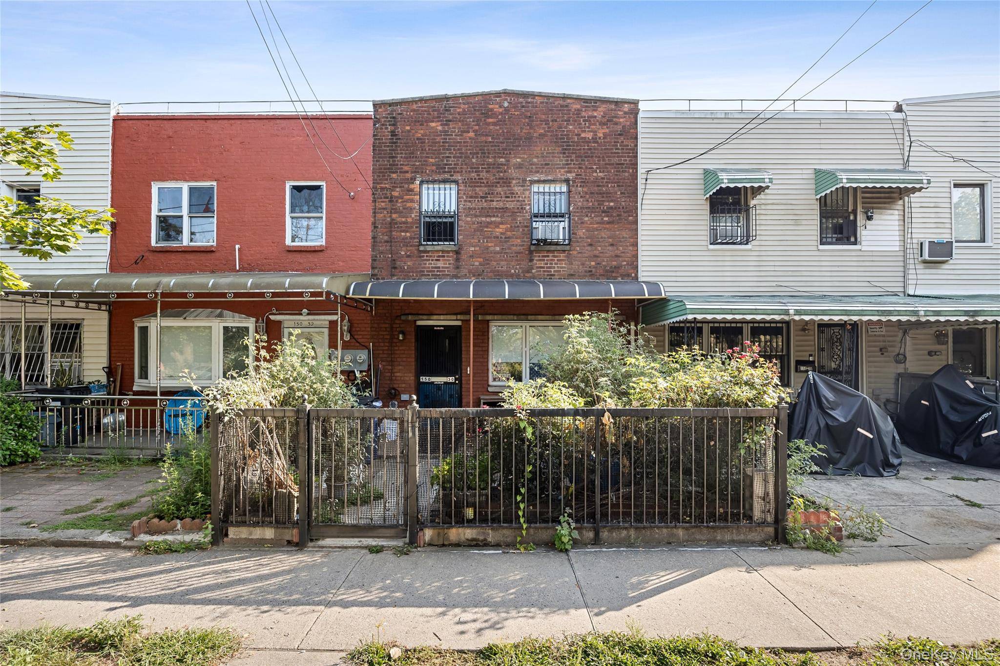 Prime Flushing location Attached one family home featuring 5 bedrooms and 3.