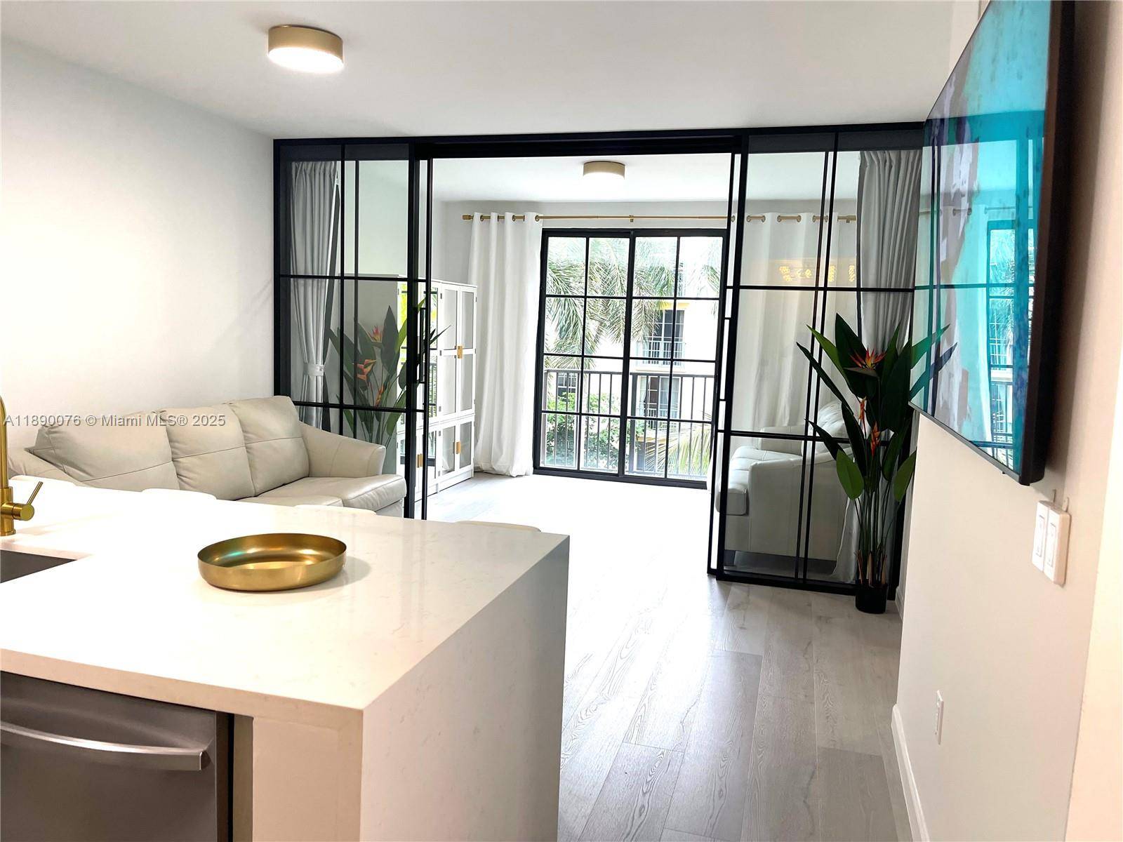 Experience this stunning, FULLY FURNISHED condo at CityPlace Shops, just minutes from the beach !