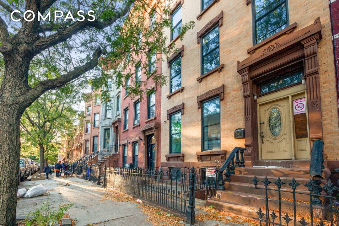 This 25 foot wide legal 3 family, four story house is waiting for you to bring your imagination.