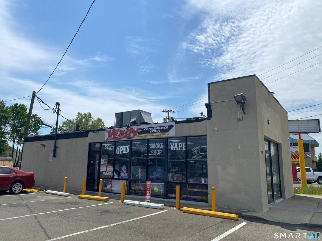 DRIVE THRU WINDOW in a Stand Alone Building situated along a Retail Corridor.