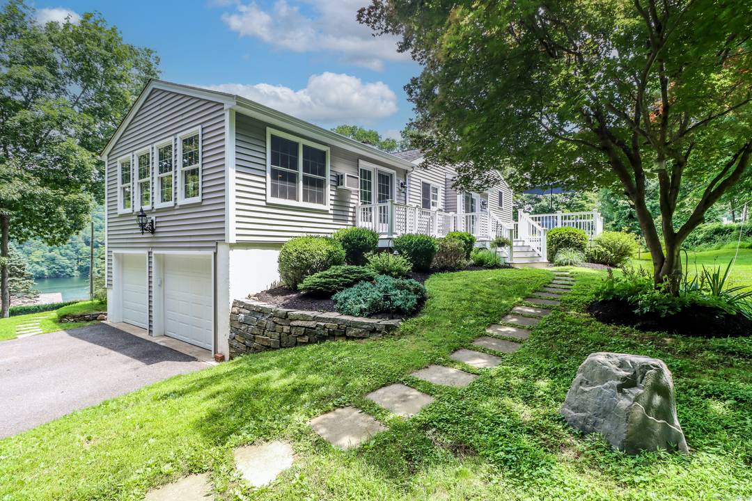 A rare opportunity to enjoy the beauty of Lake Lillinonah with space, privacy, and value.