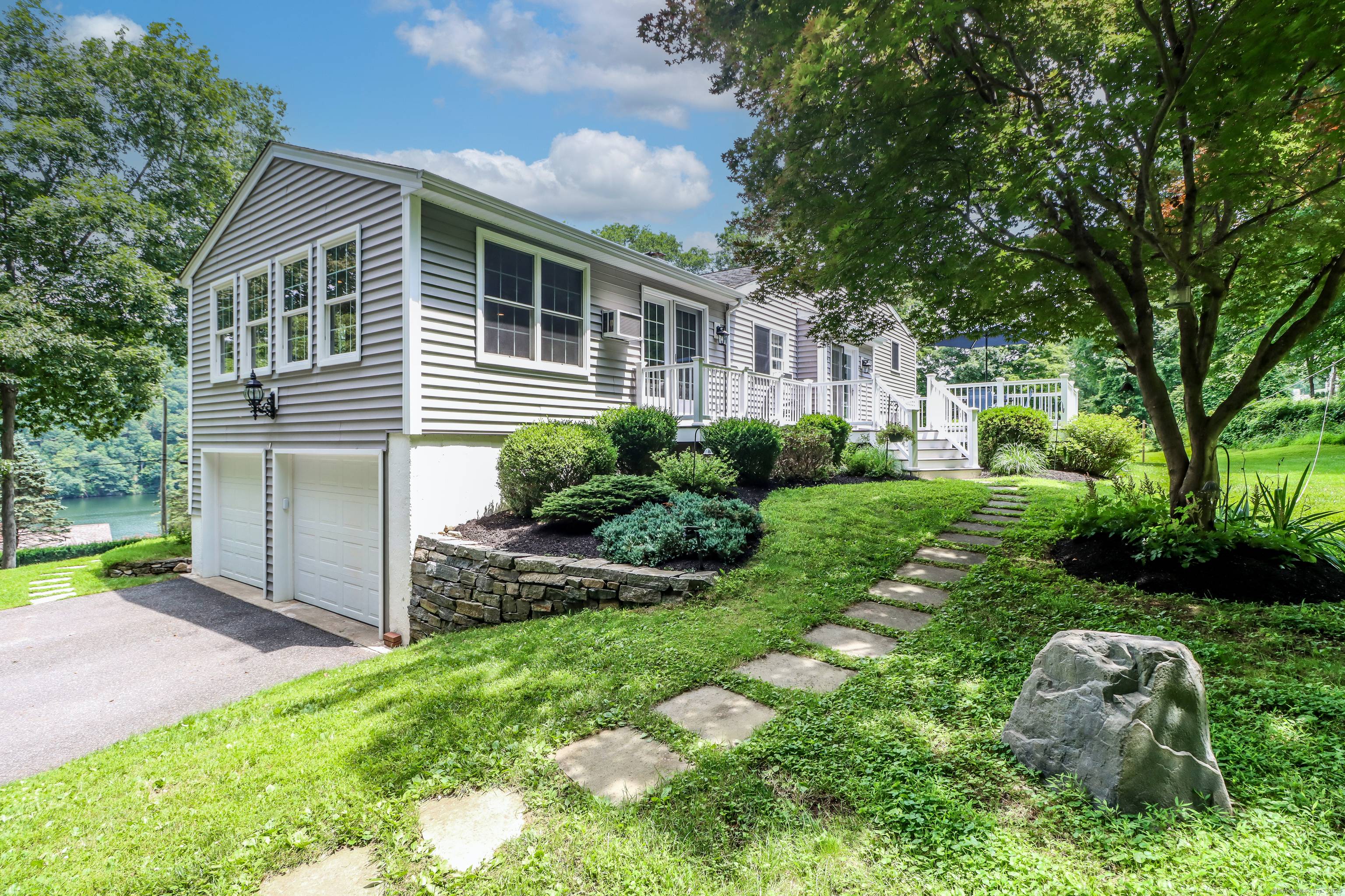 A rare opportunity to enjoy the beauty of Lake Lillinonah with space, privacy, and value.