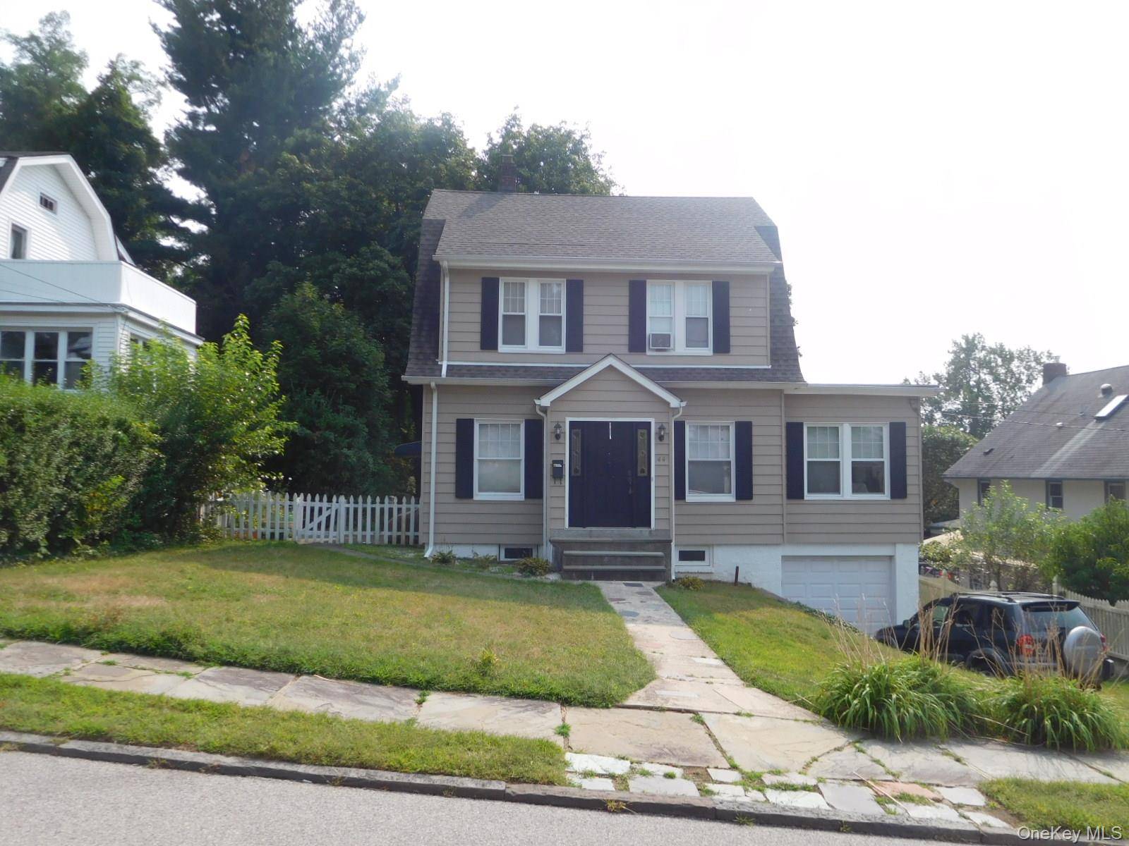Mohegan Heights Colonial in great condition Renovated Kitchen, beautiful wood flooring, charm galore, attached garage and super yard !