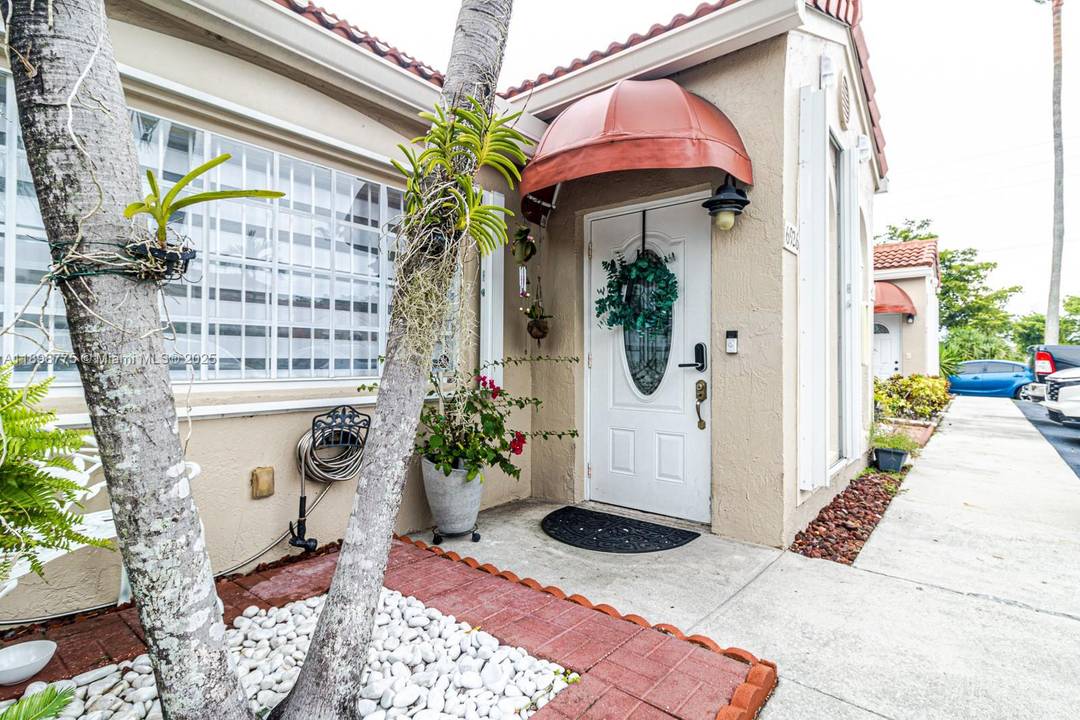 Beautifully appointed Townhouse in the Heart of Miami Lakes with a full bedroom and bathroom on the first floor.