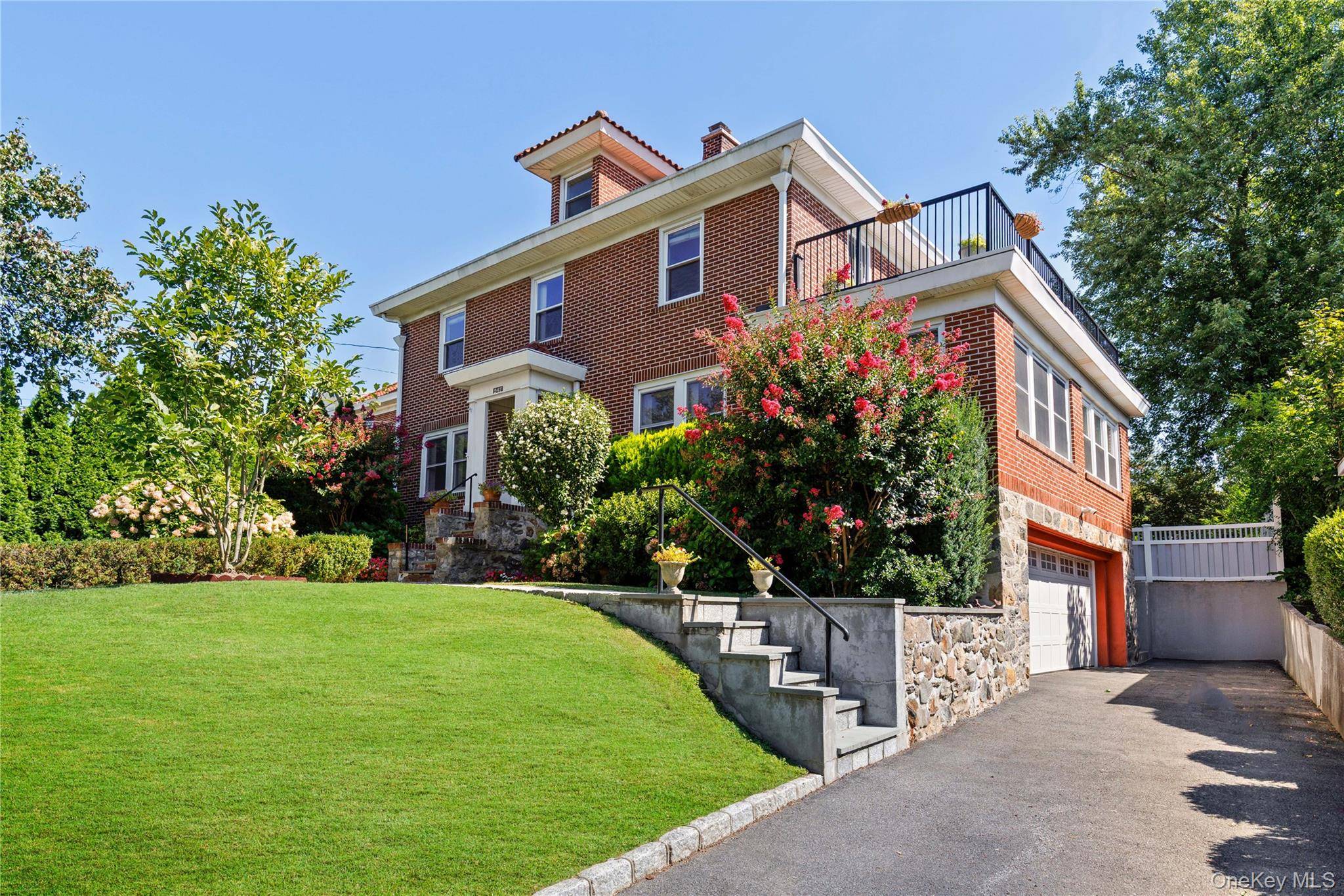 Move right in ! Timeless classic Georgian brick Colonial.
