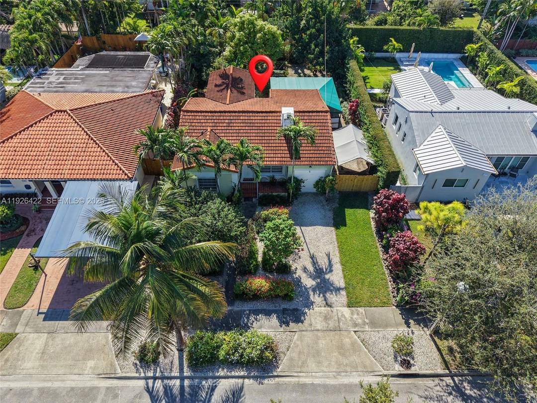 Step into the charm of Old Miami with this 3 bedroom, 2 bath Silverbluff classic !