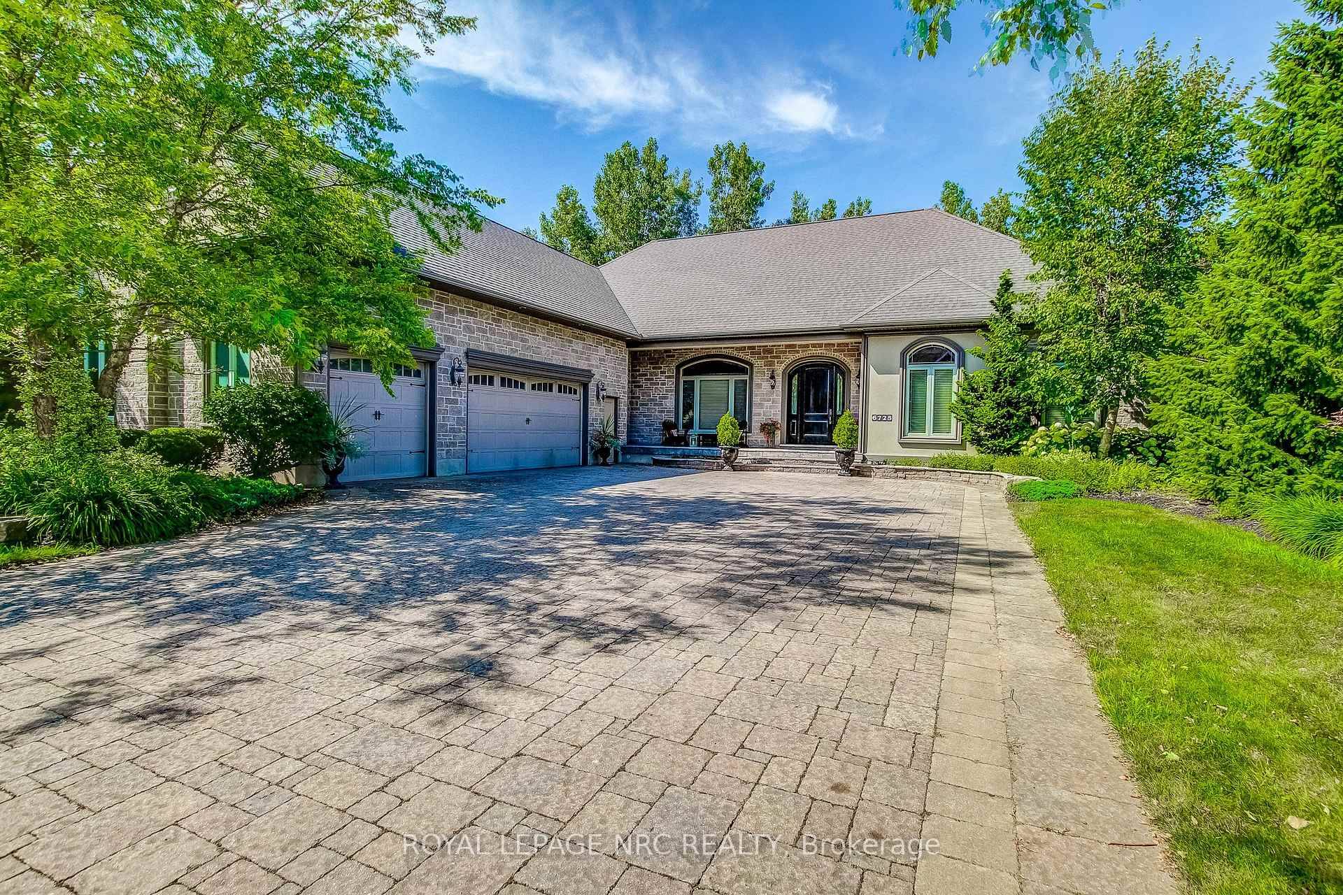Prepare to be amazed the moment you step through the grand, upgraded solid mahogany door of this remarkable open concept bungalow.