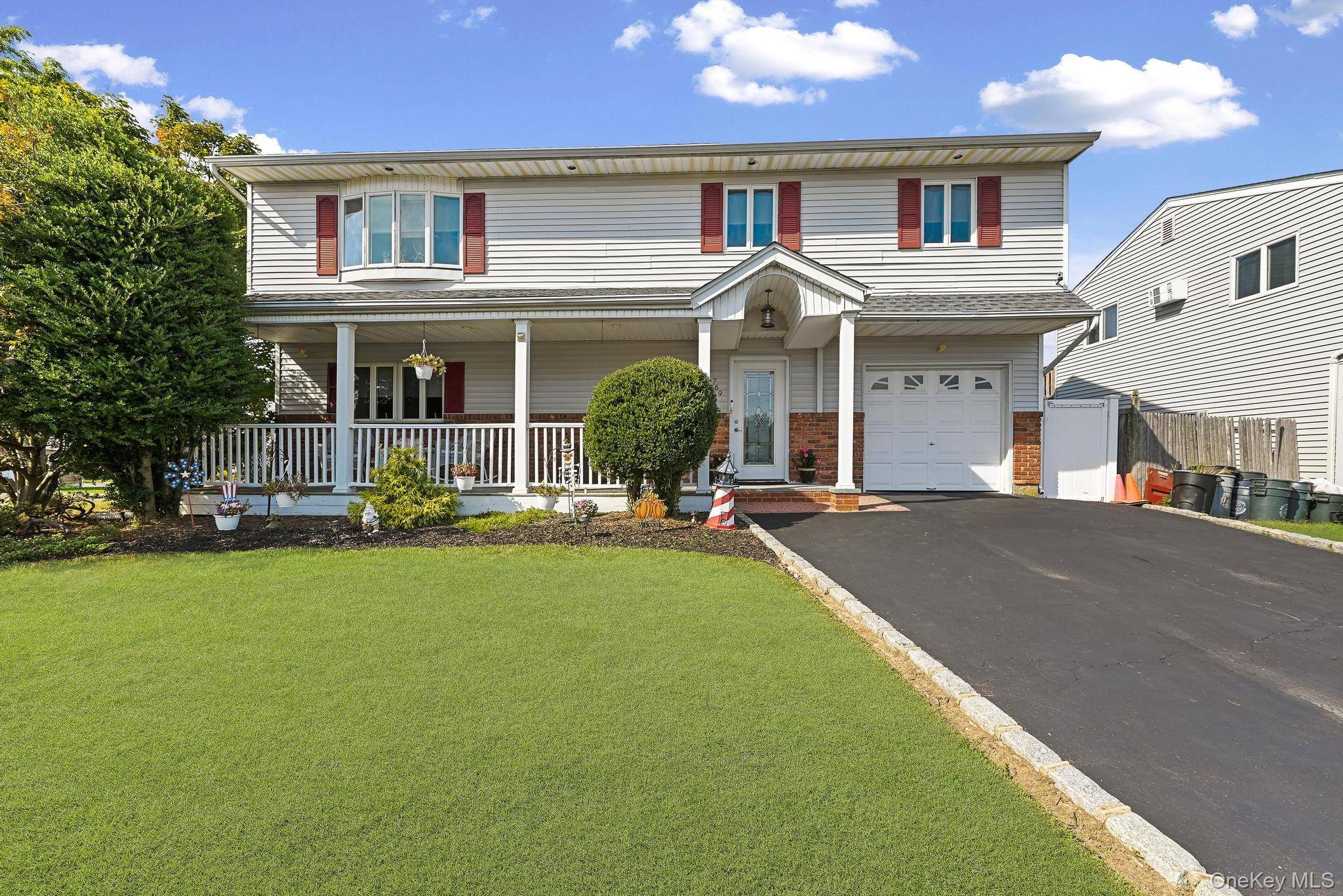 Yearning for your coastal community dream home a block away from Great South Bay ?