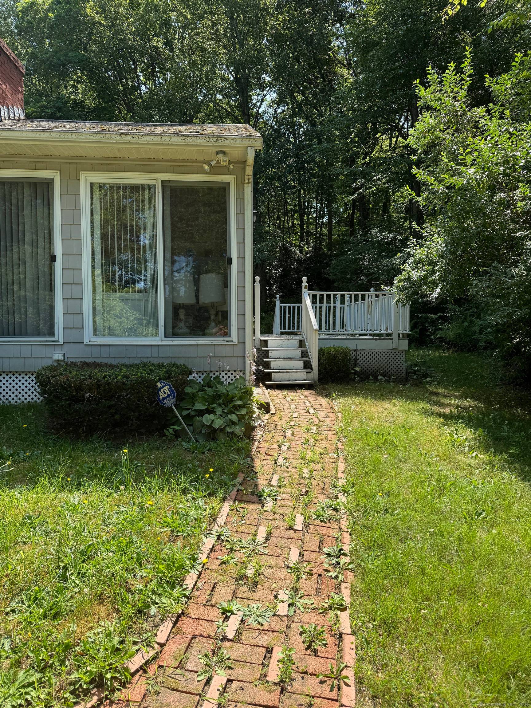 WONDERFUL ranch on 2 private, wooded acres in Stonington !