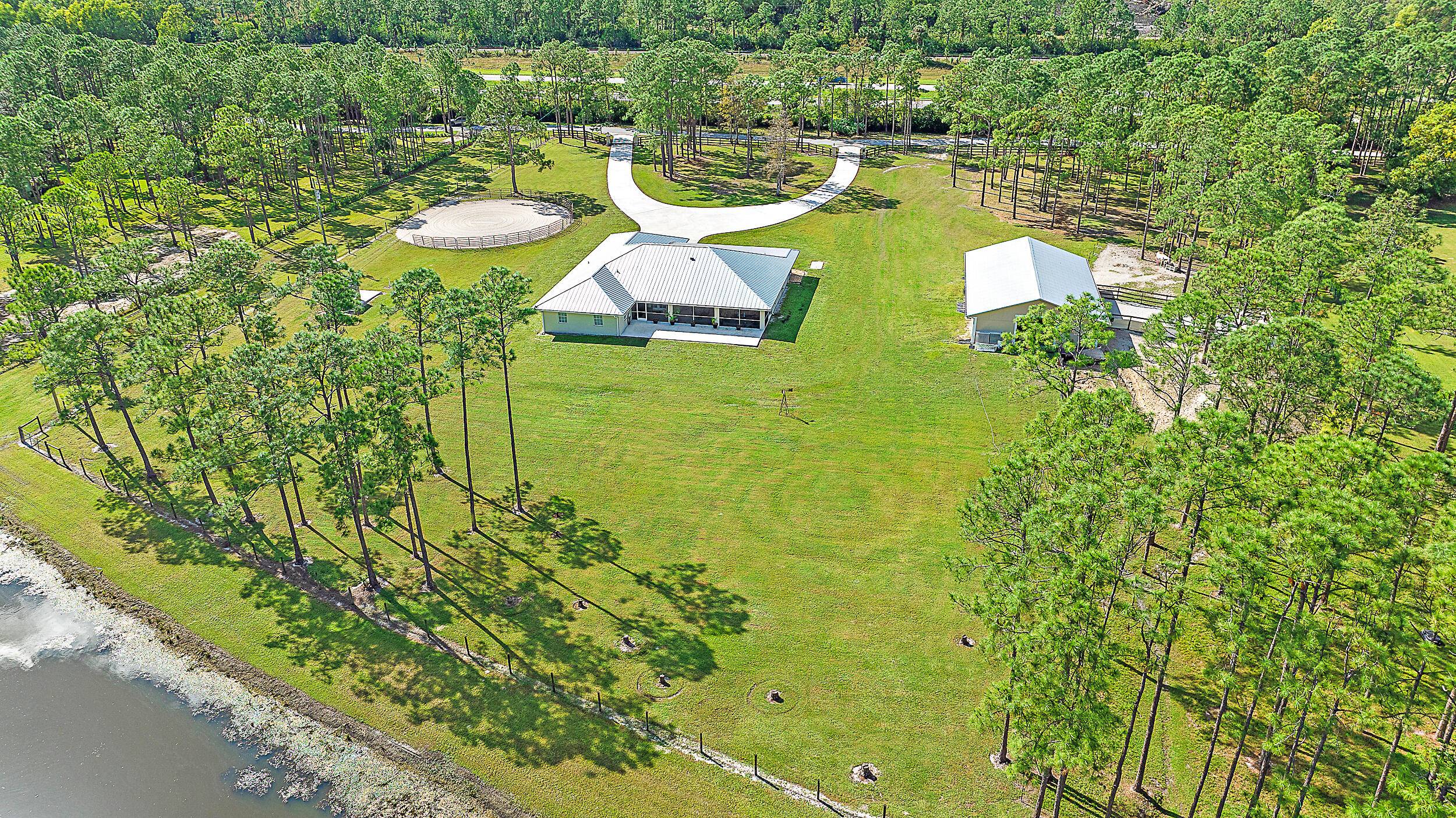 An incredible value in the sought after Palm Beach Gardens equestrian community of Caloosa, this solid CBS concrete block home, featuring a 2022 metal roof and a 2018 built 2, ...