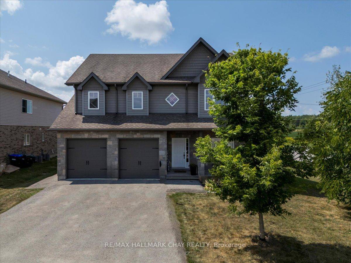 Flexible Lakeside Duplex This is ideal for investors or extended families offering comfortable, private spaces for everyone and deeded beach access to wonderful Lake Couchiching.