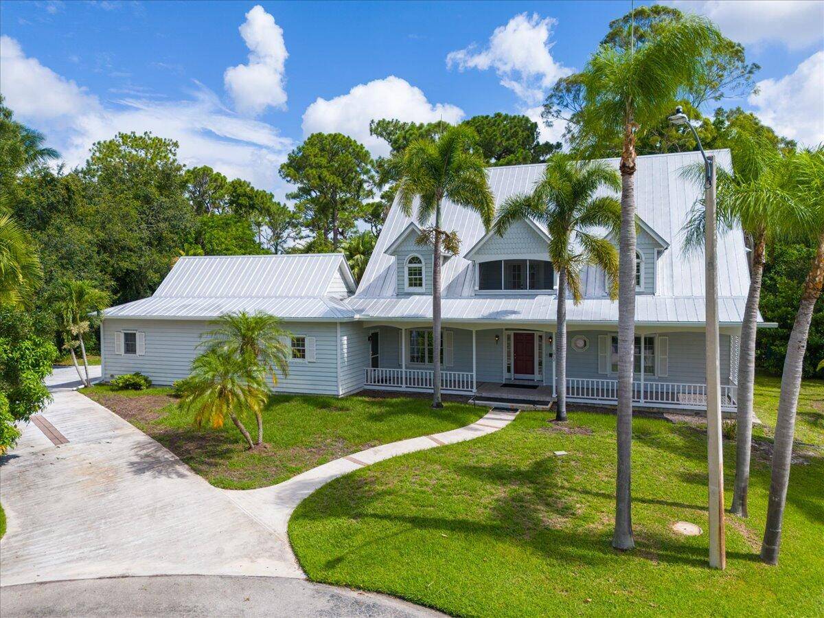 A rare Southern inspired gem in Sandpiper Bay's peaceful riverfront enclave ; Kitching Cove Estates.
