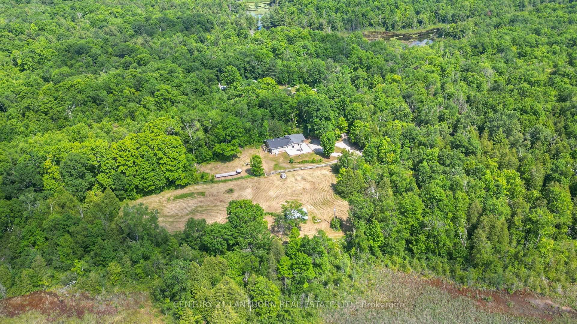 Looking for privacy ? 119 acres with a long driveway will give you what you are looking for and leads up to this renovated 2190 sq ft bungalow.