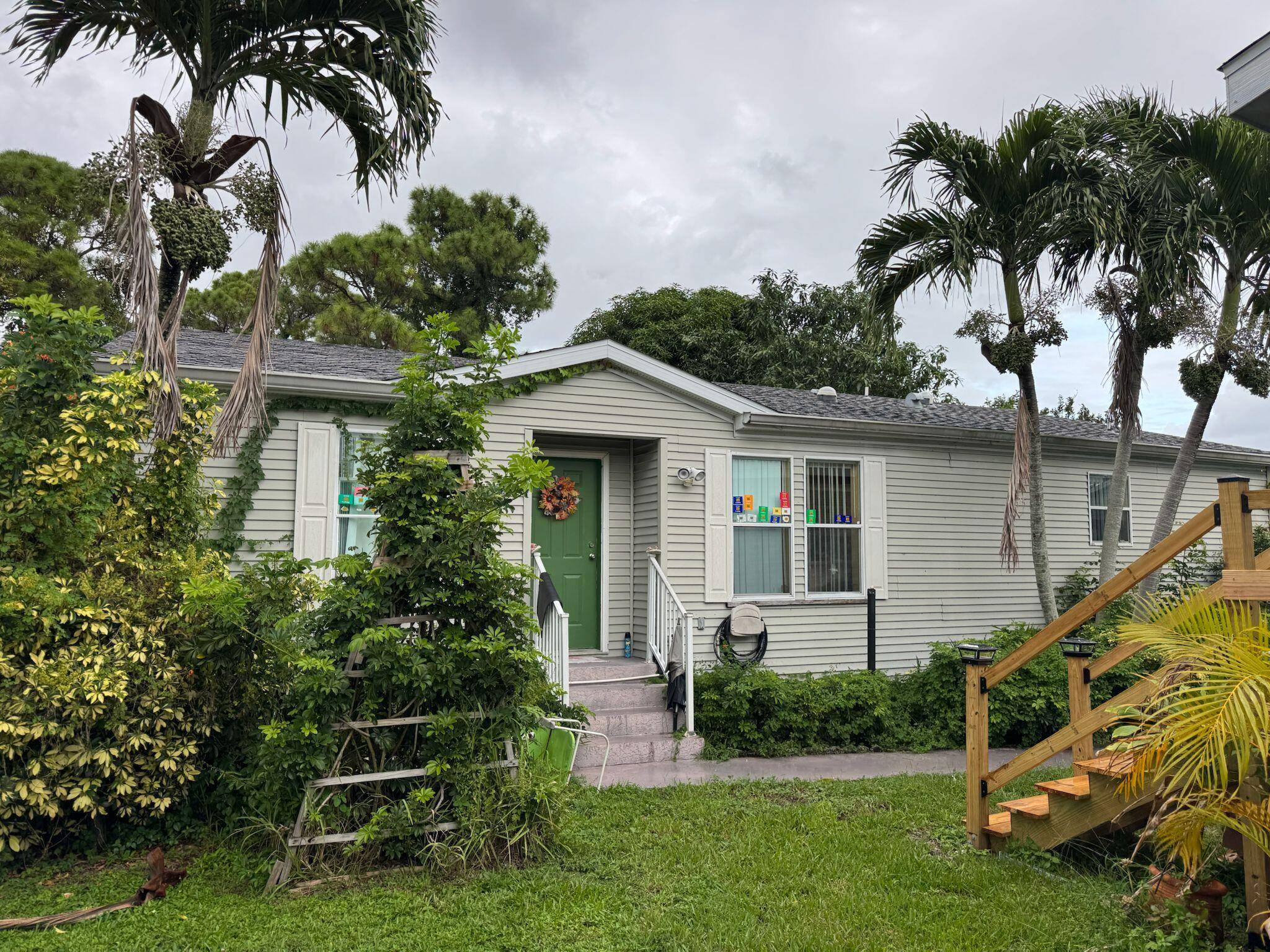 Charming mobile home featuring 3 bedrooms, 2 bathrooms, All age, spacious kitchen with several cabinets, laundry room, and a spacious, breezy porch perfect for relaxing.