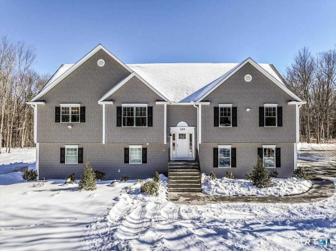 This large custom contemporary home, set on a beautiful 2.