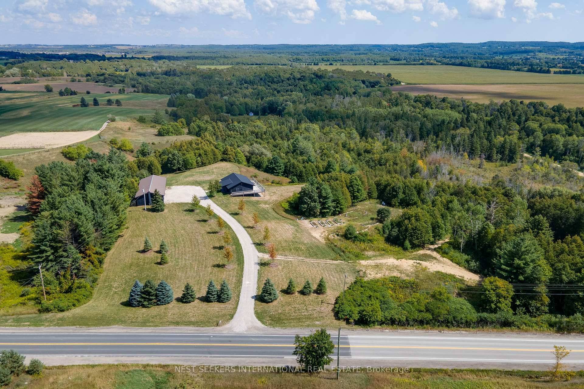 10 Acres of country Living Just Minutes to Hwy 400A rare opportunity to own a beautifully updated bungalow on 10 private acres with sweeping valley views and a second gated ...