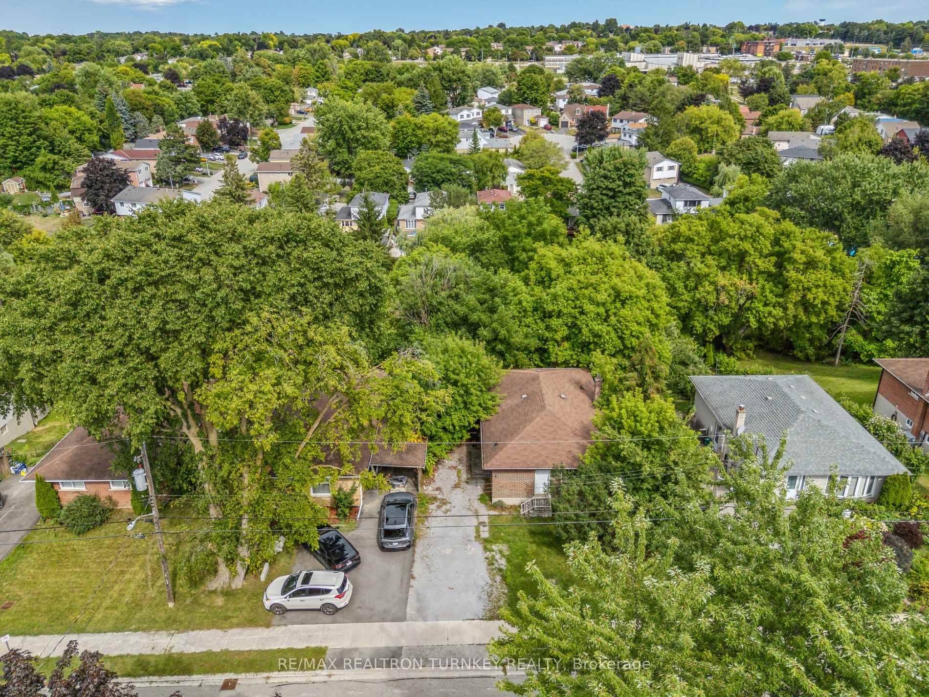 Spacious, Detached Brick Bungalow nestled on a Premium Ravine Lot 50 x 150' with Separate Entrance to Bright Walk Out basement !