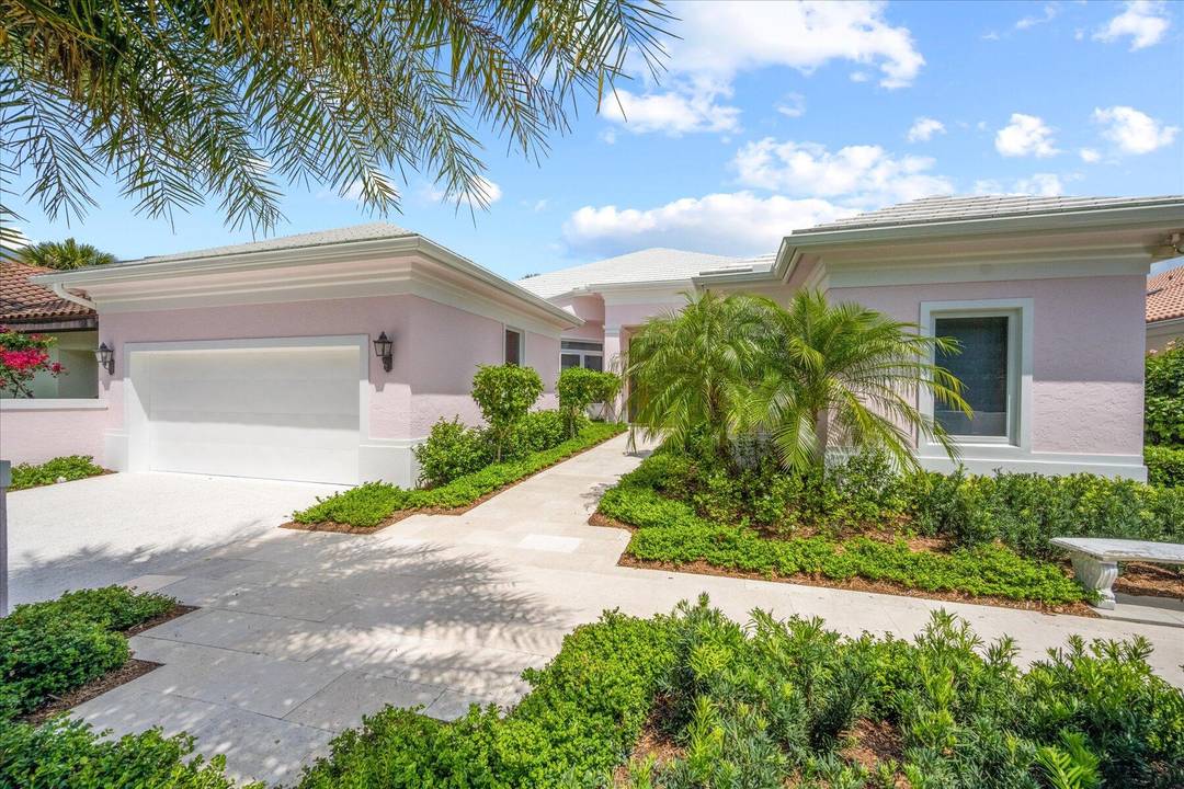Exceptional Loxahatchee Club lake and golf course views can be found from this superbly remodeled single story 3 bedroom, 3 bath gem, with total privacy front and back.