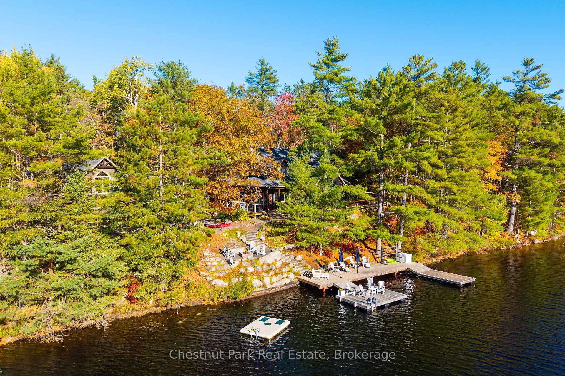 Set against the backdrop of breathtaking wide open lake views, this stunning post and beam square cut cottage captures the essence of Muskoka living.