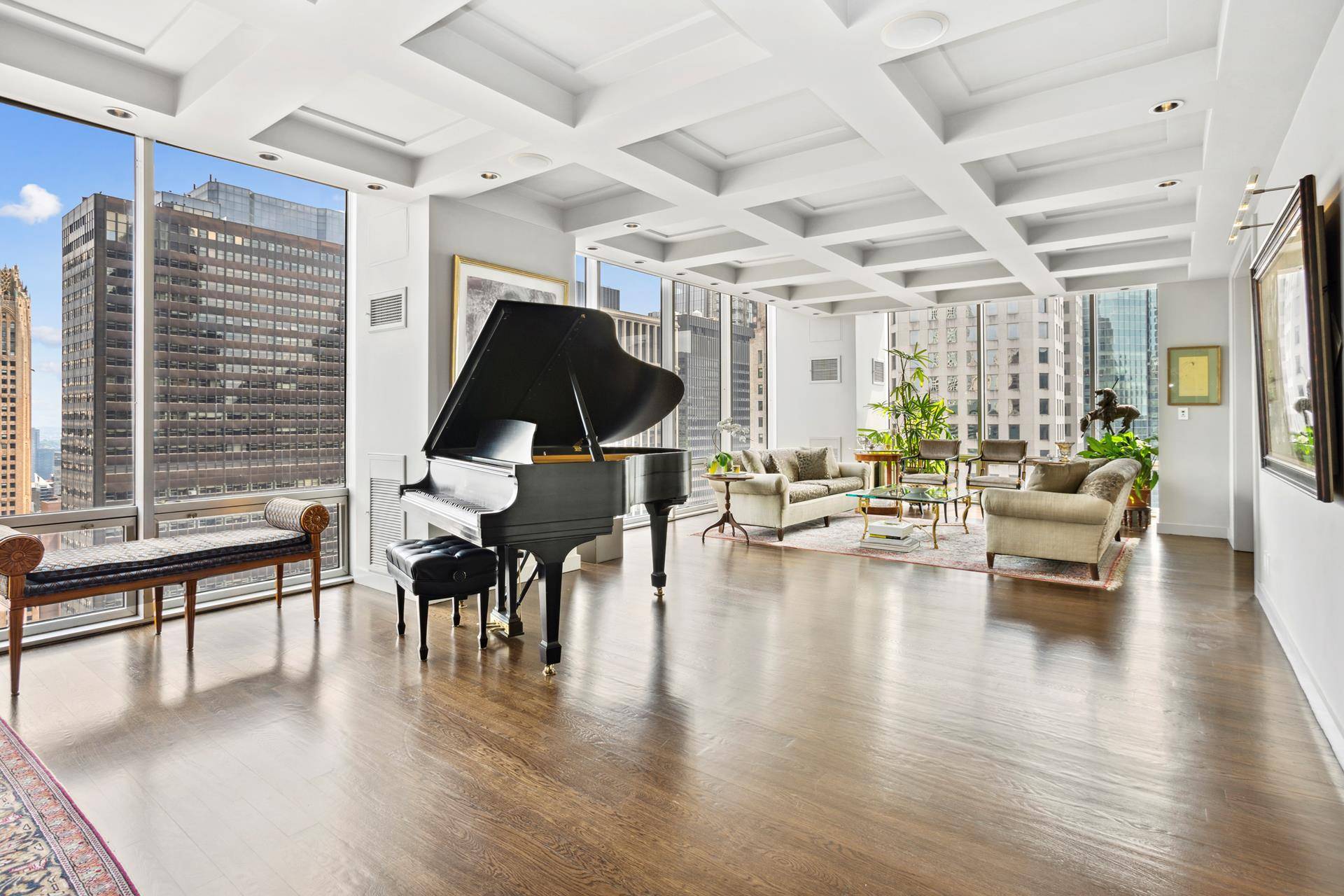 Experience the epitome of Fifth Avenue living in this high floor, updated corner duplex apartment.