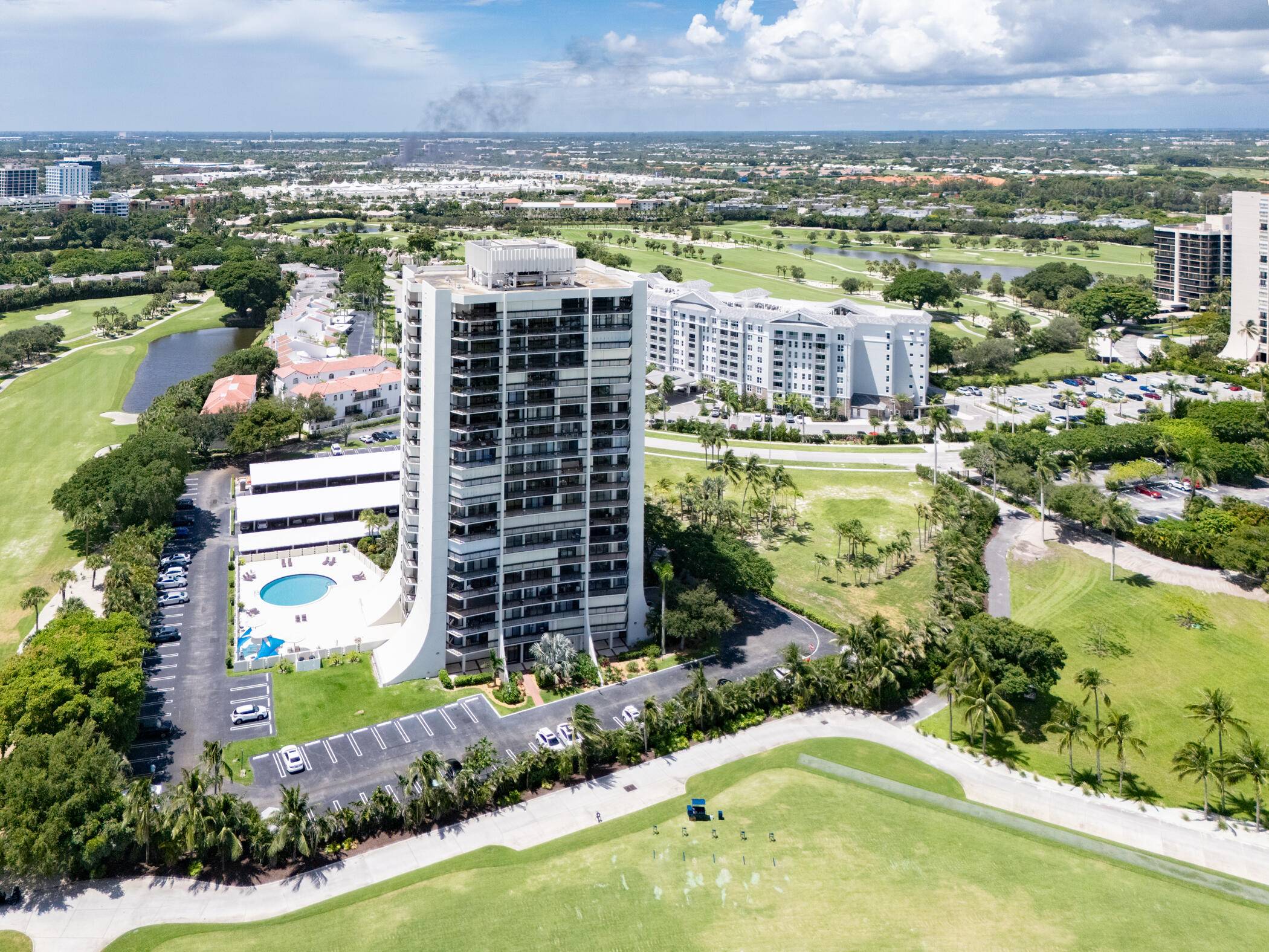 Enjoy the Magnificent panoramic views of the Golf Course in this beautiful open 2 bedroom 2 bath corner unit located in the prestigious gated community of Lands of the President.