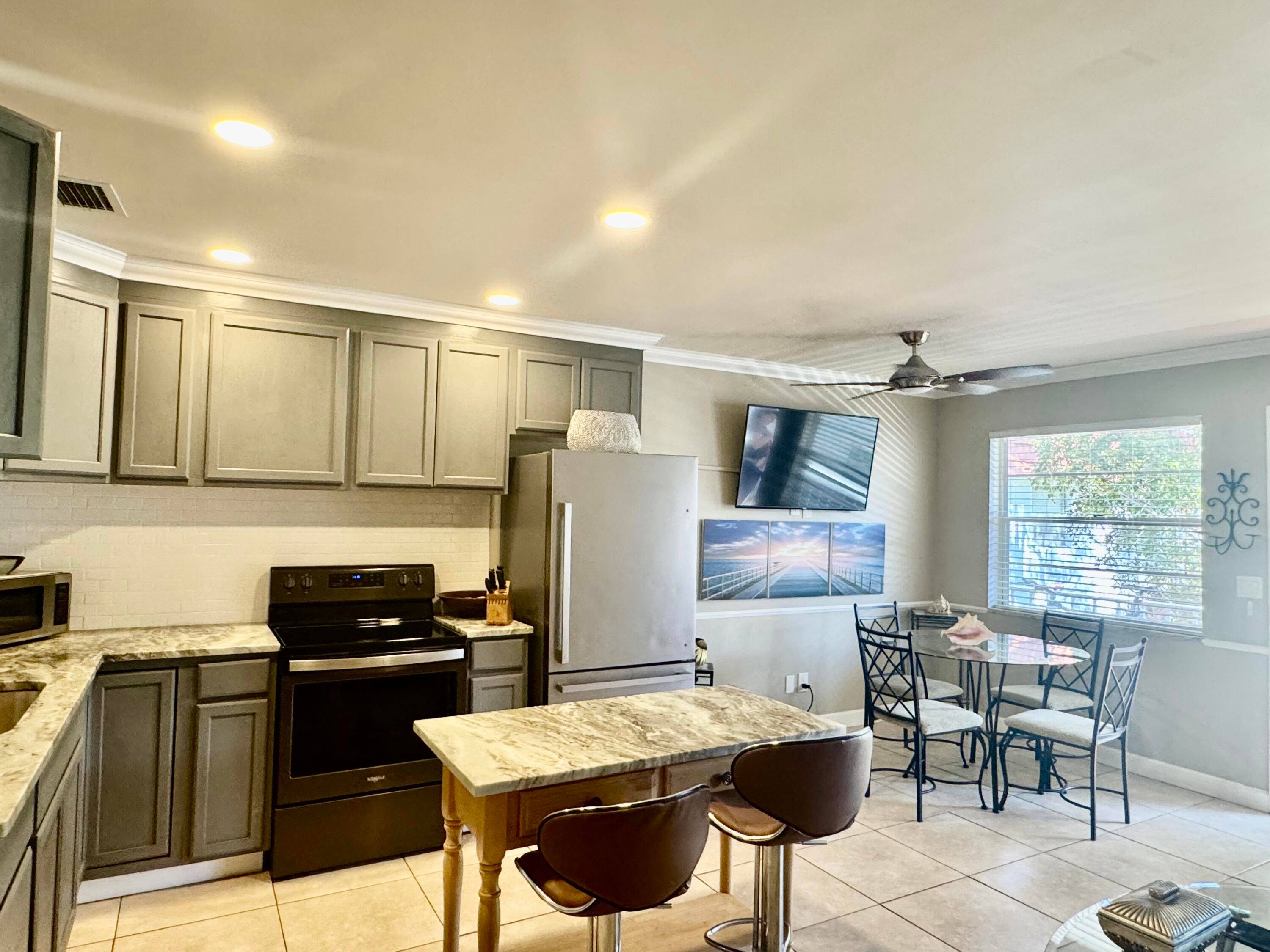 NICELY RENOVATED 1 BEDROOM 1 BATH 2nd FLOOR CONDO WITH NEW KITCHEN, NEW BATHROOM AND TILED FLOORS THROUGHOUT.