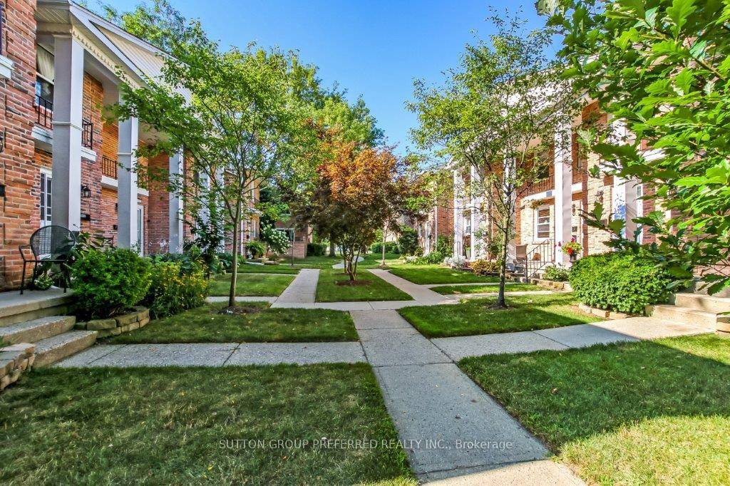 The Optimum word in describing this 2 bedroom townhouse end unit is WOW !