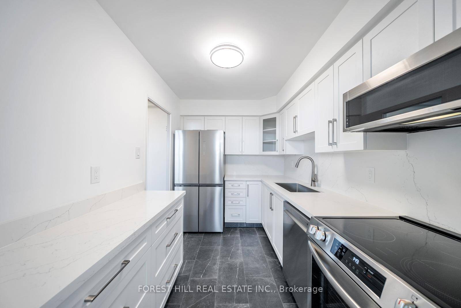 Welcome to Suite 2114 at 360 Ridelle Avenue a beautifully renovated, move in ready condo set high above the city with sweeping, unobstructed east facing views over Upper Forest Hill, ...