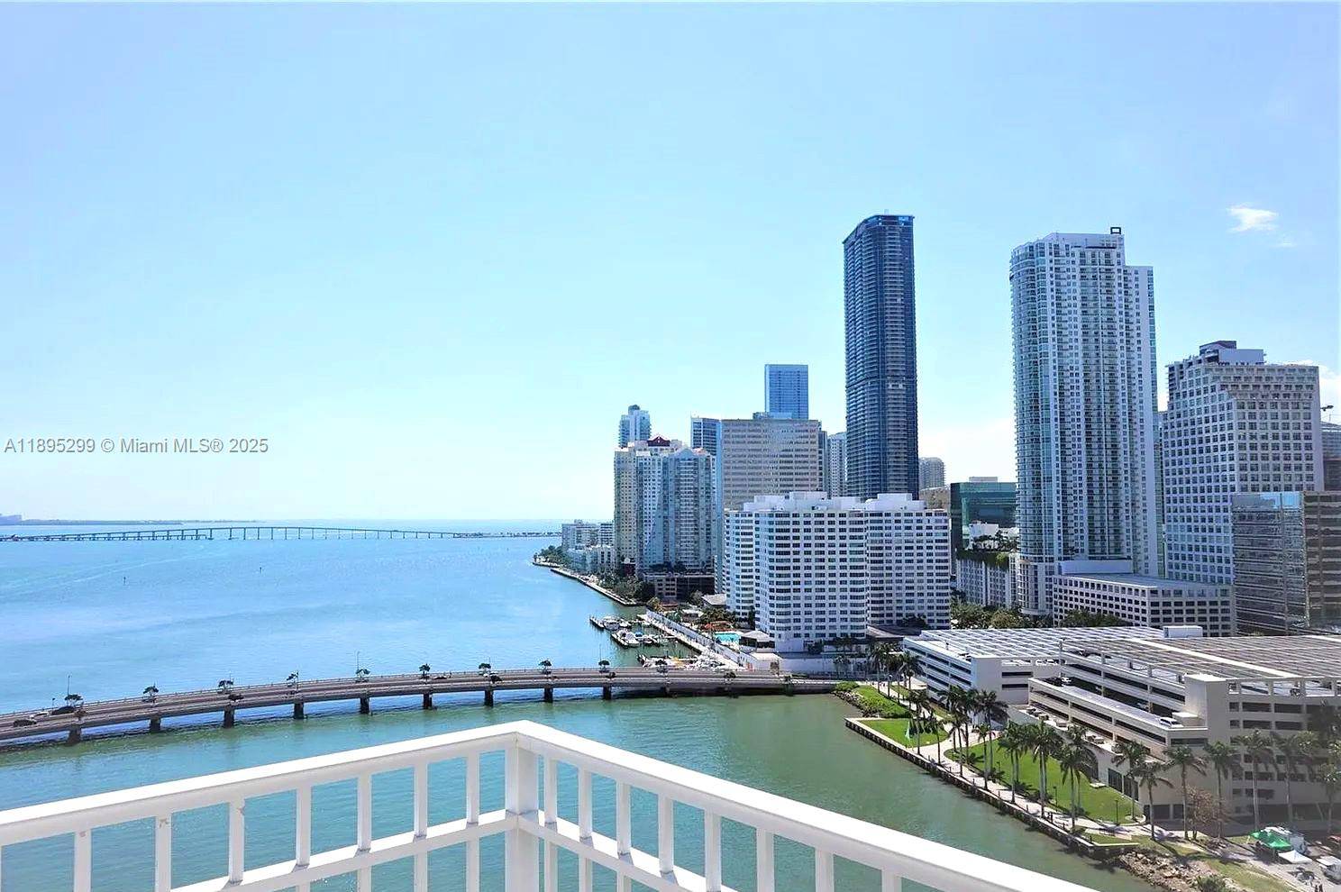 Spacious corner 2 bedroom, 2 bath split plan unit on the 19th floor of Courts Brickell Key, offering panoramic views of Biscayne Bay and the Miami skyline.