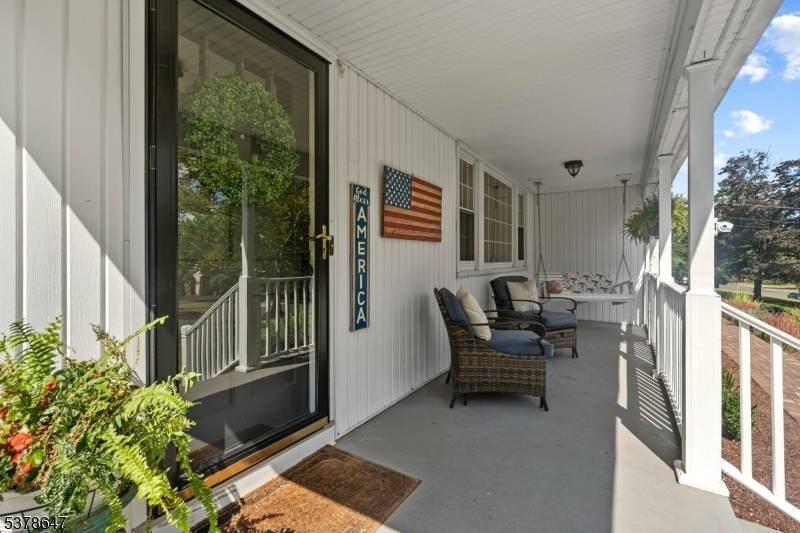 Welcome to this beautifully maintained Center Hall Colonial featuring 4 bedrooms, 2.