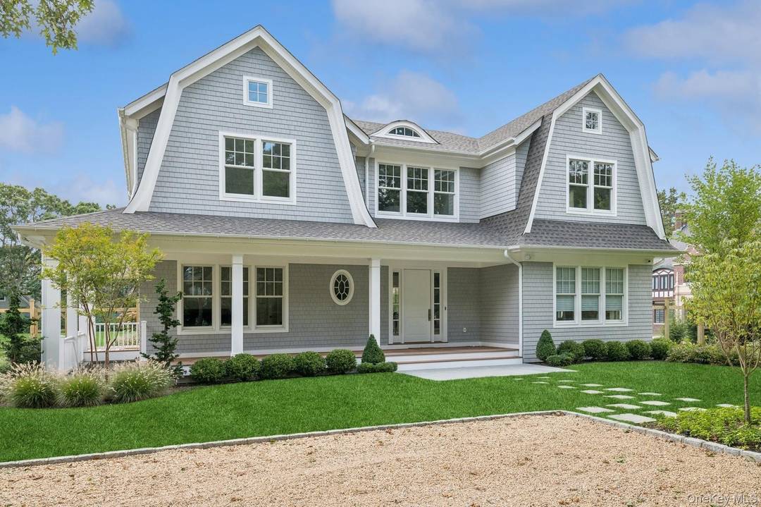 Welcome to 165 Oneck Lane, a haven of comfort and style nestled down a long private driveway in a the estate section of the village.