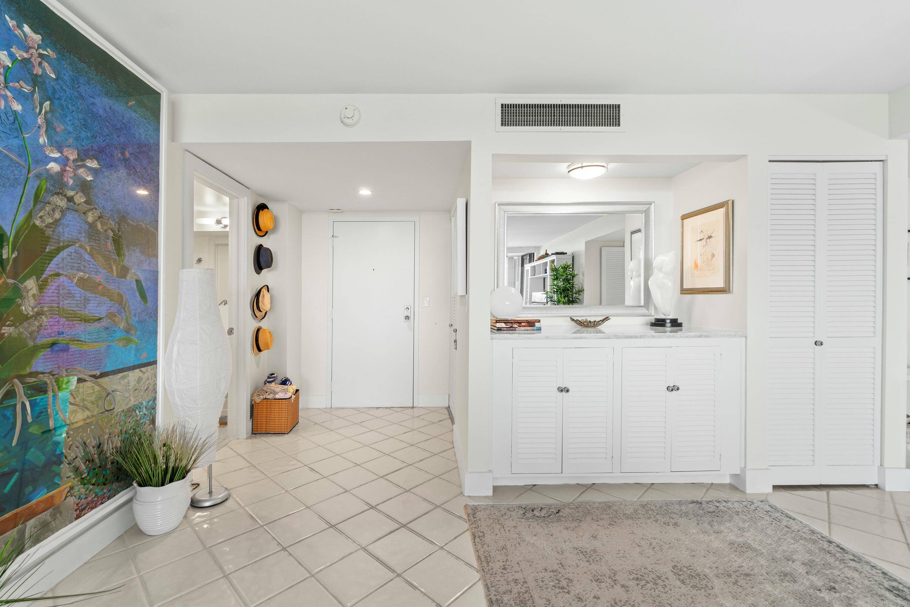 Step into paradise in this beautiful 2 bedroom condo located in the highly sought after Mayfair in South Palm Beach.