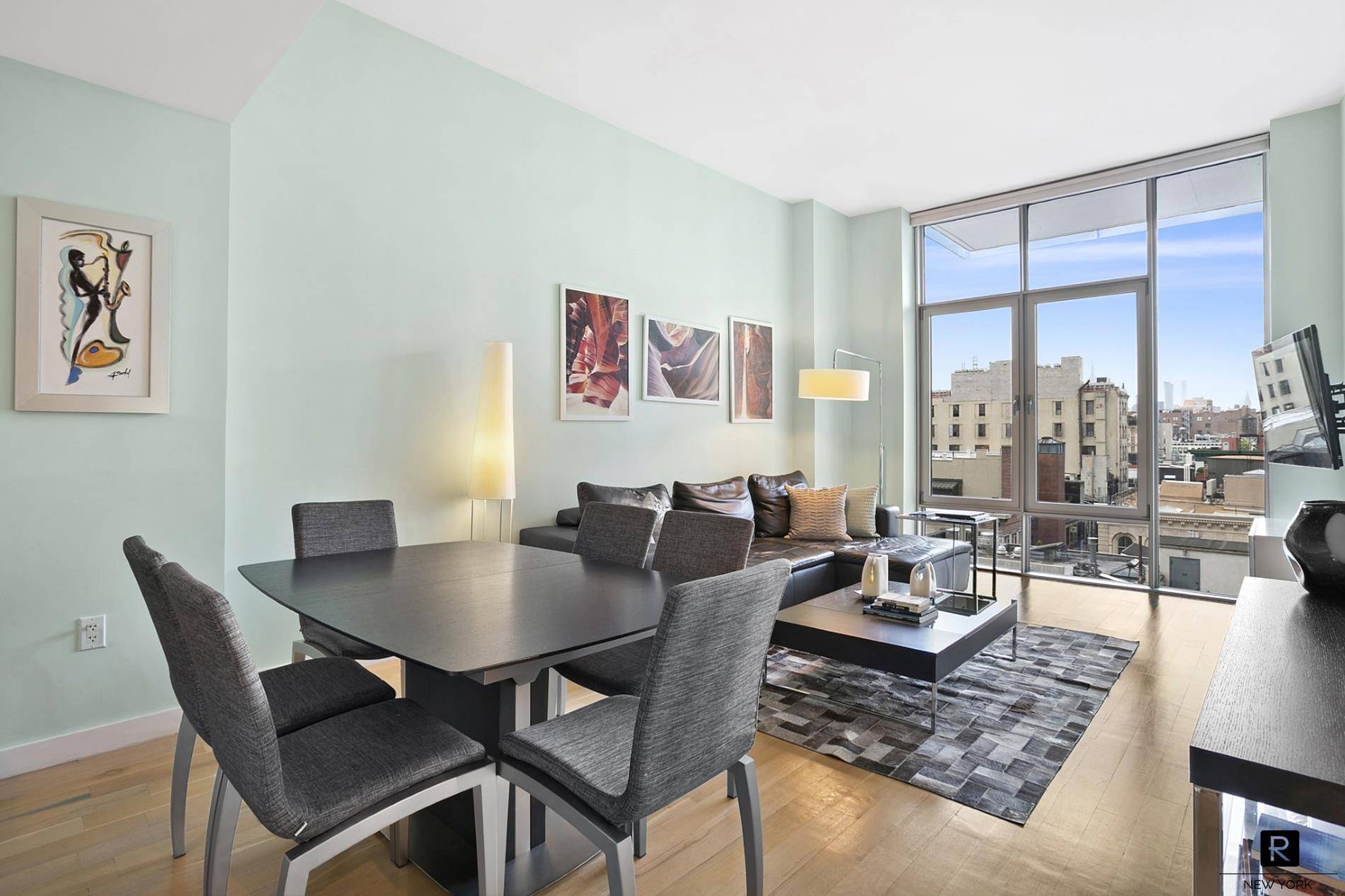 Experience the vibrant Tribeca lifestyle in Residence 11C, a stunning contemporary two bedroom plus home office, two bath condominium.