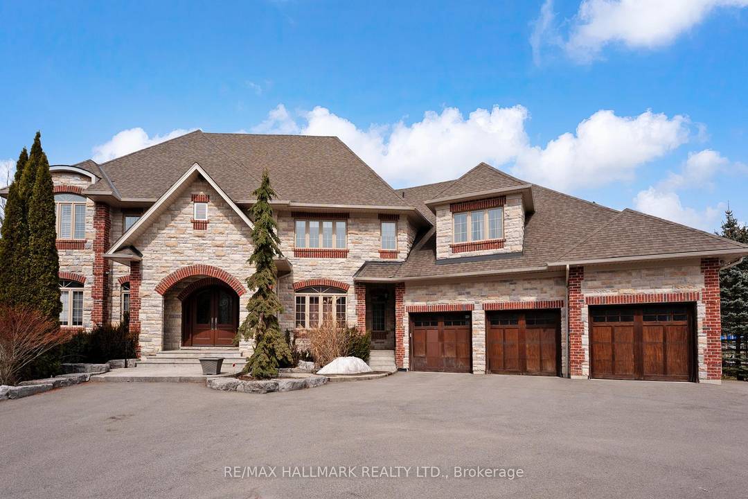 A Rare Custom Masterpiece Of Countryside Luxury Set On Nearly 5 Acres Of Serene Wooded Grounds With A Tranquil Stream !