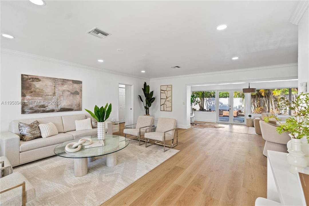 Coastal living meets comfort in this renovated single family home in the sought after Coral Ridge Country Club Estates.