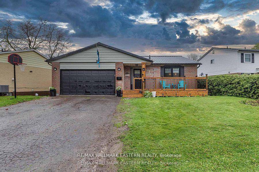 Welcome Home ! This delightful bungalow with a walkout basement and metal roof is perfectly nestled on a large town lot in one of Port Hope's most sought after areas.
