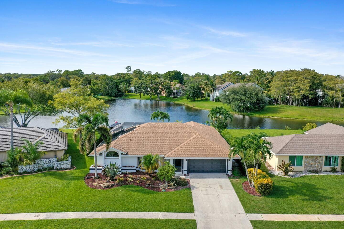 Discover the allure of this stunning 5 bedroom, 3 bathroom home in the sought after Sugar Pond Manor, boasting the picturesque water view you've been longing for !
