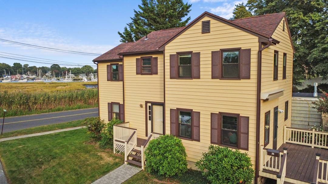 Welcome to 30 Kinloch Street Nestled just outside Milford's charming Historic District, this rare harbor side gem offers the perfect blend of classic New England character and coastal living.