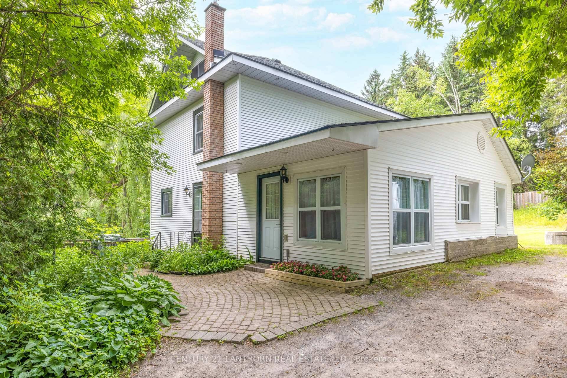 This charming century home is hidden on a private treed property, a quiet get away from daily hustle and bustle.