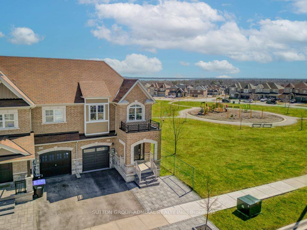 Welcome to this spacious 4 bedroom, 3 bathroom end unit townhouse, attached to the neighboring home only by the garage and a single bedroom wall on the second floor, offering ...