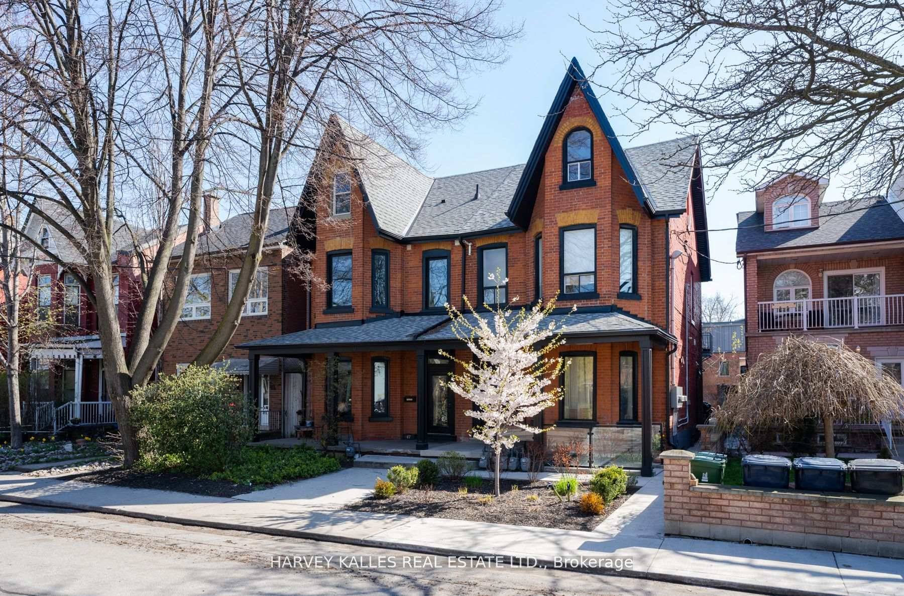 Queen West's most adorable lower level 2 bedroom sprawling apartment.