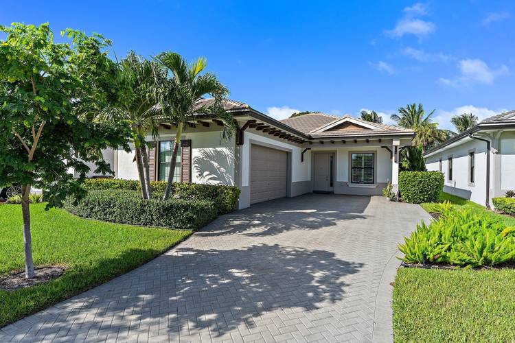 Welcome to this beautifully furnished and thoughtfully appointed home in the exclusive community of Banyan Cay.