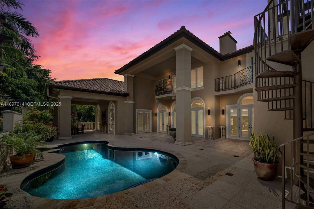 Situated within 24 7 guard gated Entrada Estates, this Grove estate balances scale, function, and flexibility.