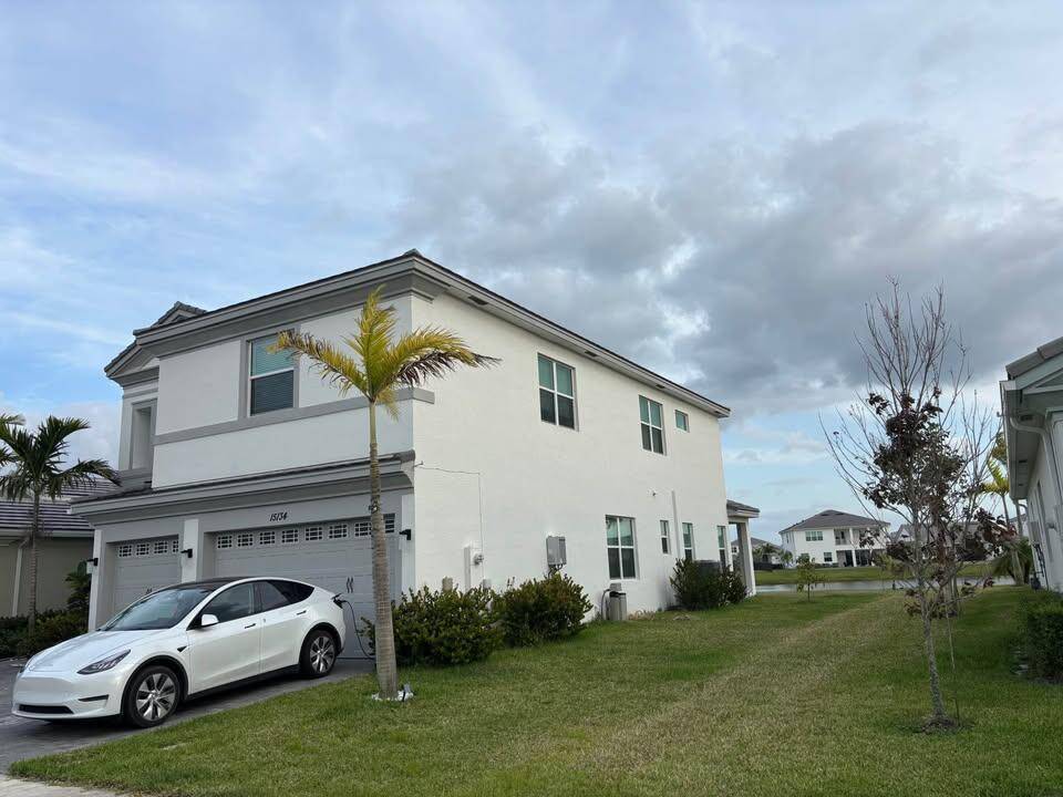 Enjoy breathtaking lake views in this exceptional home, where natural light and refreshing airflow fill every space.