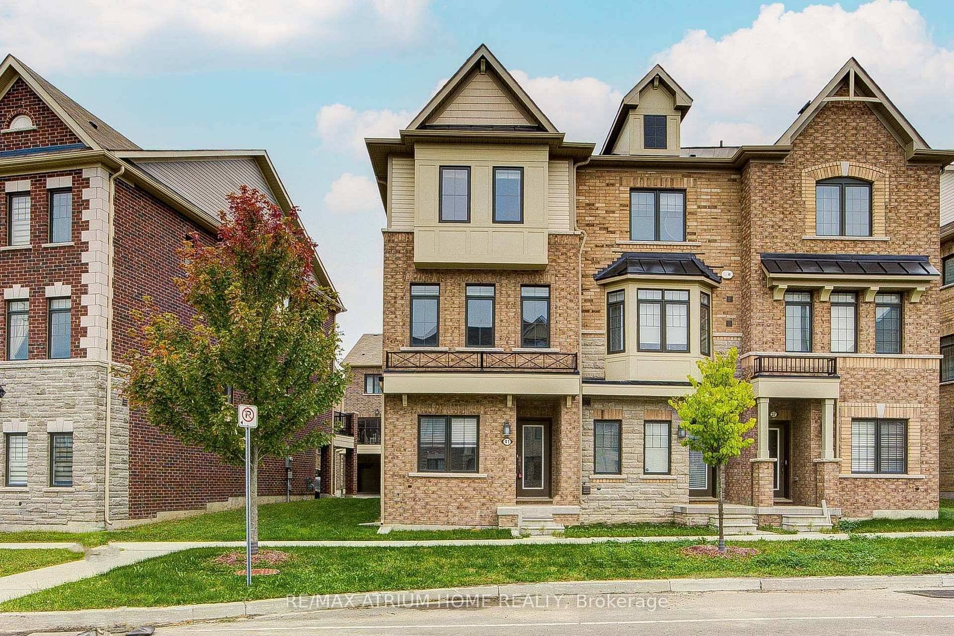 Welcome To This Luxurious Sun filled End Unit Freehold Townhouse In The Prestigious Victoria Square community.