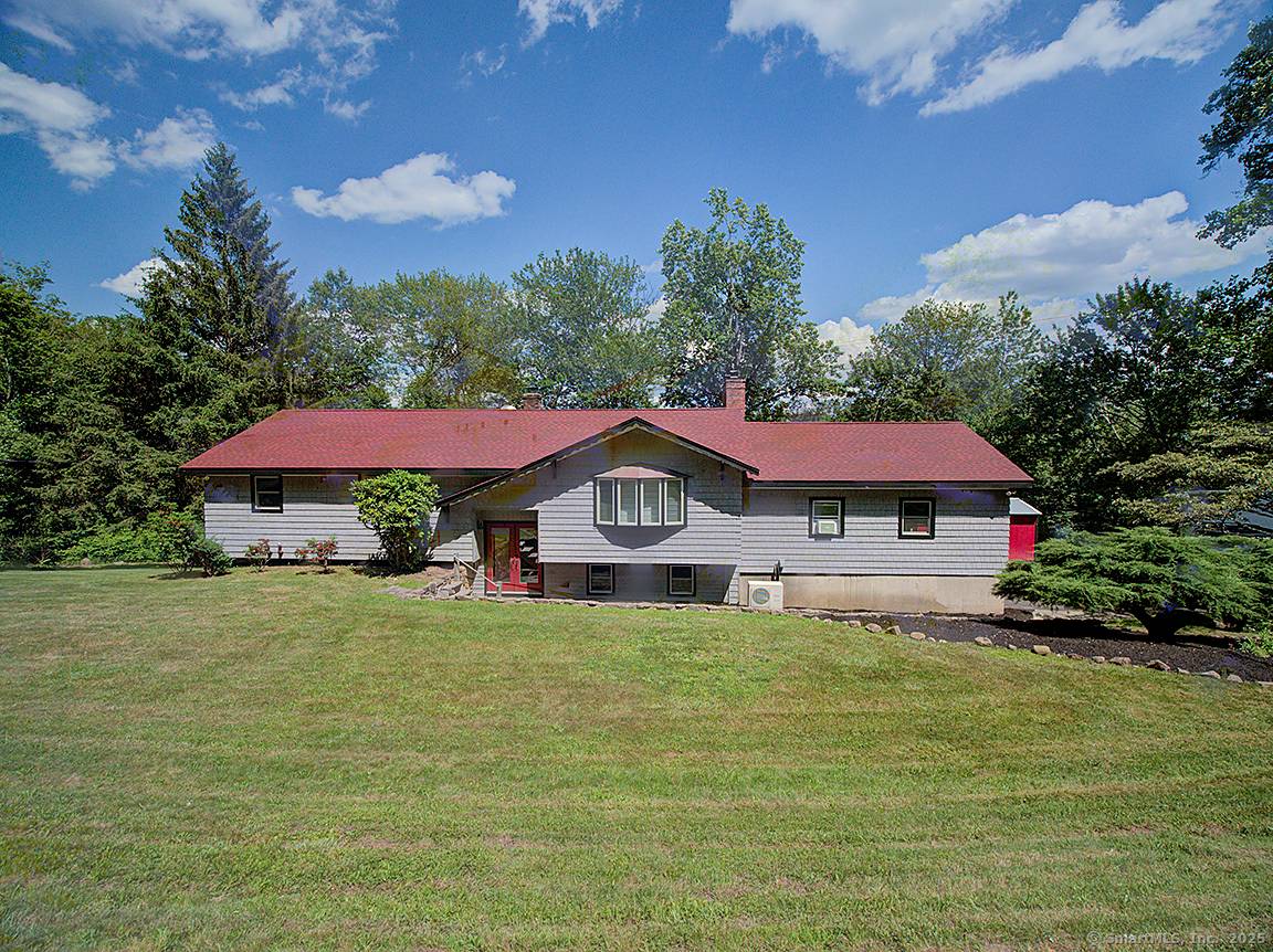 Welcome to This Charming Raised Ranch in the heart of Hamden, CT.