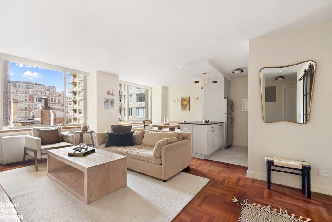 Two units combined creating a large two bedroom, convertible three bedroom home with two full baths and a laundry room with full size machines.