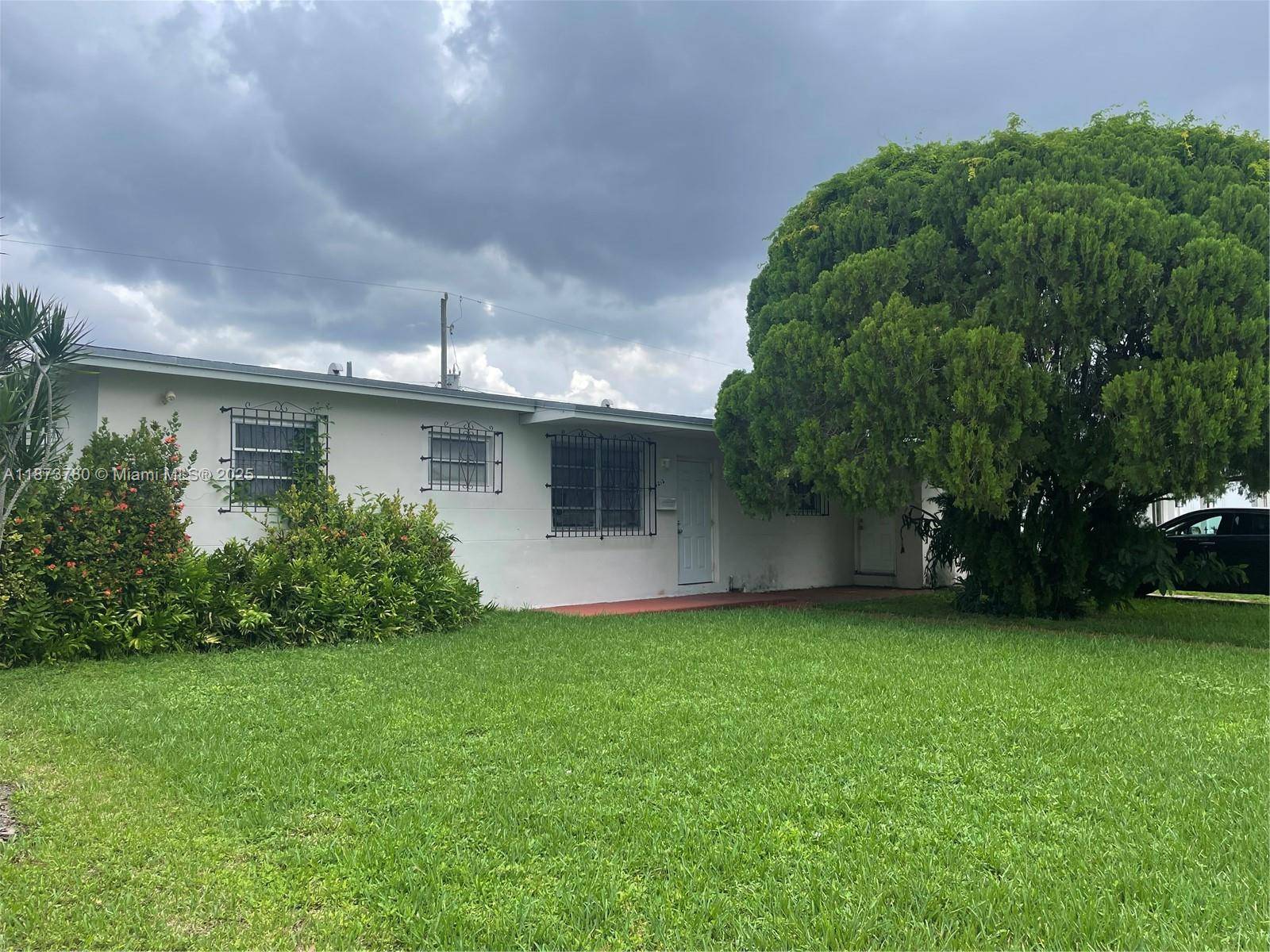 Opportunity in Olympia Heights to make this house your own.