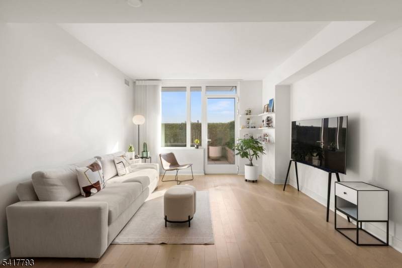 Incredible South facing 2 bed 2 bath with extremely rare patio in the luxury community of 1000 Maxwell, Toll Brothers' newest Hoboken building.