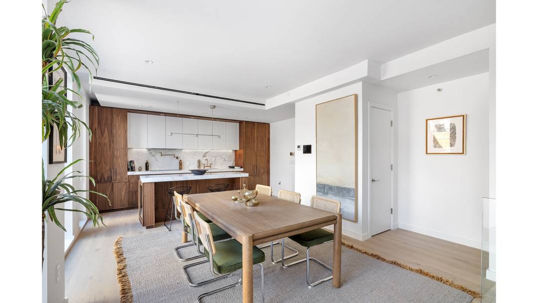 This townhouse inspired home is an expansive three level garden residence thoughtfully designed to balance openness with privacy, offering a seamless distinction between living, entertaining, and restful spaces.